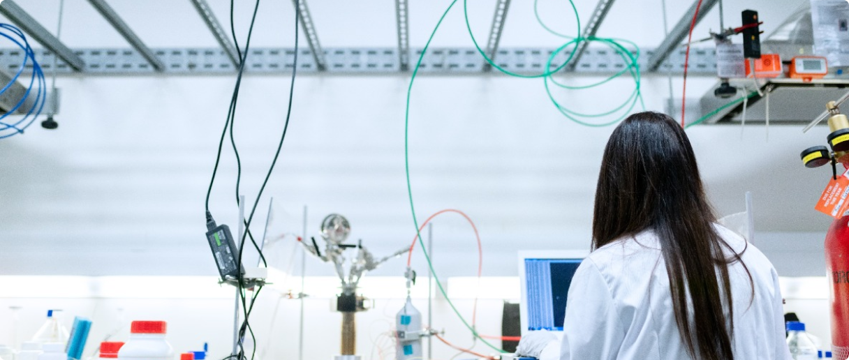 A person working at a computer in a laboratory